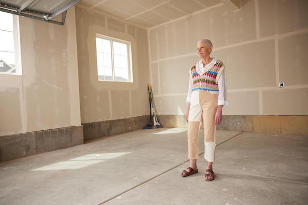 Woman in empty garage